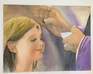 girl receiving ashes from priest on Ash Wednesday