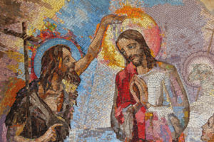 MEDJUGORJE, BOSNIA AND HERZEGOVINA, 2016. Mosaic of the baptism of Jesus Christ by Saint John the Baptist as the first Luminous mystery.